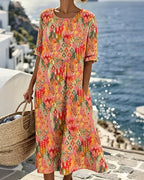 Emma | Loose & Light Floral Midi Dress