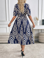 Selina – Geometric Flow Midi Dress