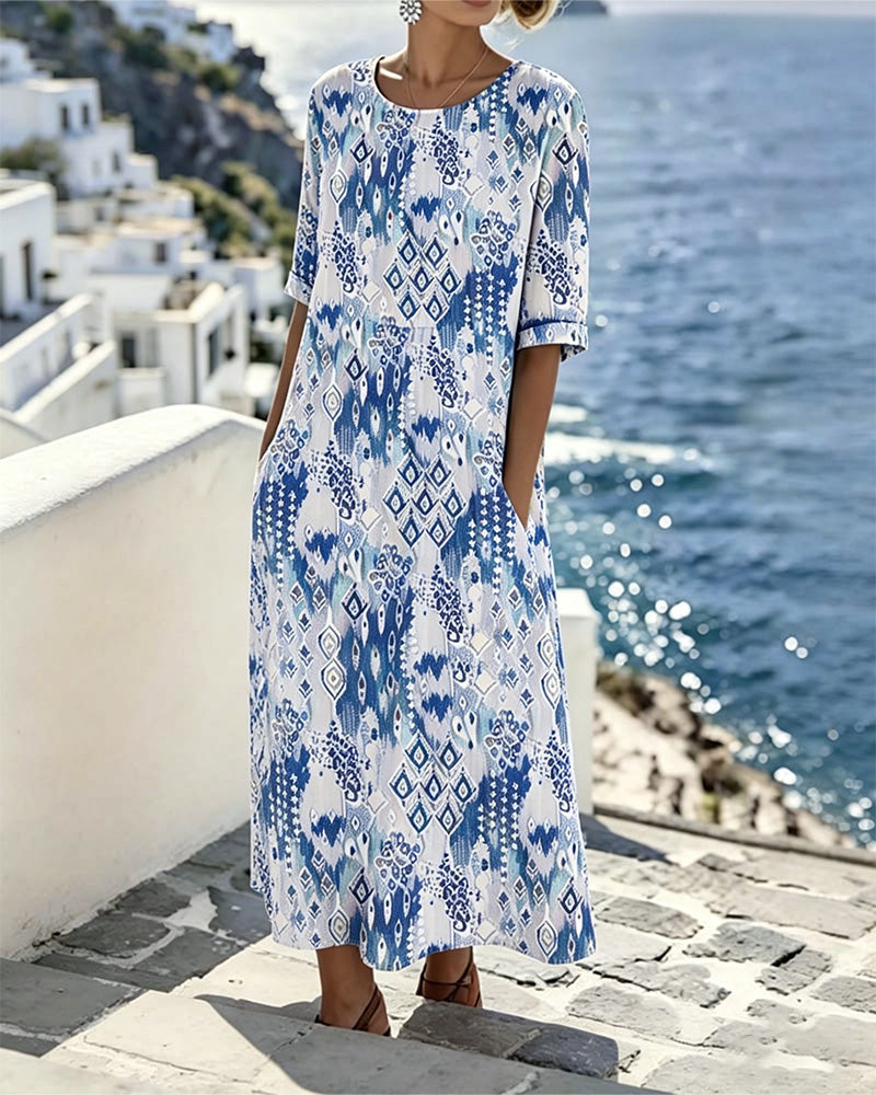 Emma | Loose & Light Floral Midi Dress